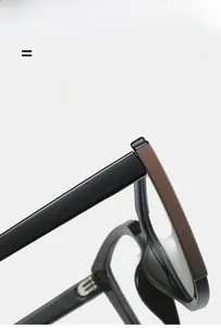 Macro detail of lightweight TR90 eyeglasses frame with brown accent hinge and shiny black finish