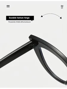 Close-up of durable metal hinge on black cat-eye glasses frame with glossy finish