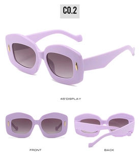 Three-view display of lavender oval sunglasses with gold accents and gradient brown lenses