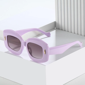 Oval light purple retro sunglasses with gold metal pins and gradient grey lenses