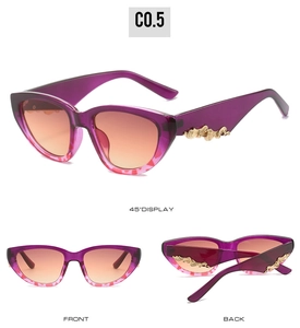Detailed views of cat eye sunglasses with purple frames and orange-pink gradient lenses