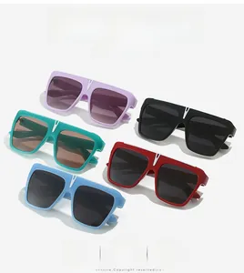 Flat top square sunglasses detail with iconic V-shaped silver metal nose bridge accents