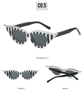 Vues détaillées sous plusieurs angles de lunettes de soleil œil-de-chat à rayures noir et blanc
