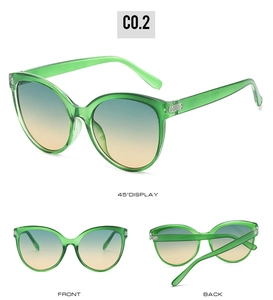 Cat eye sunglasses with green transparent frames and blue-yellow gradient lenses in three views
