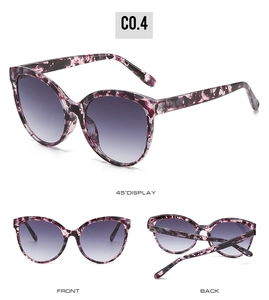 Detailed views of cat-eye purple tortoiseshell sunglasses with gradient lenses