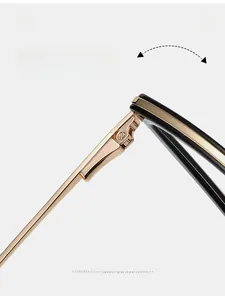Detail of durable gold-toned metal hinge on ultra-light black TR90 eyewear frame