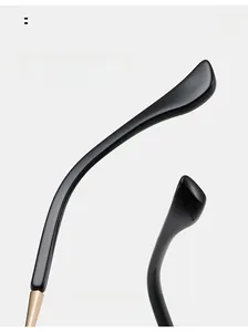 Macro detail of glossy black TR90 glasses legs with ergonomic curved arc design