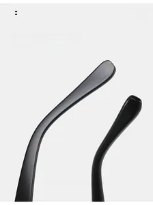 Macro detail of ergonomic curved black sunglasses legs for comfortable daily wear