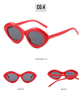 Vue triple de lunettes de soleil œil de chat rouges avec monture en forme de lèvres