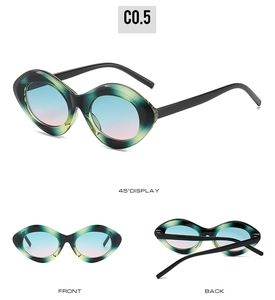 Affichage en trois vues de lunettes œil-de-chat marbrées avec verres dégradés et détails