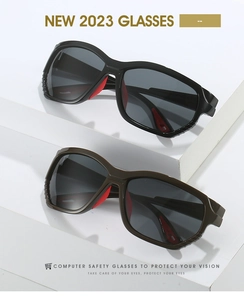 Détail de lunettes de sport avec plaquettes rouges antidérapantes et verres gris