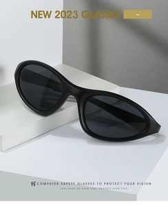 Close-up of black matte sport sunglasses on white stand with NEW 2023 GLASSES text