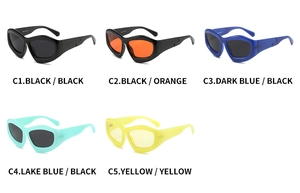Detail view of five trendy cat eye sunglasses in black, orange, blue and yellow frames