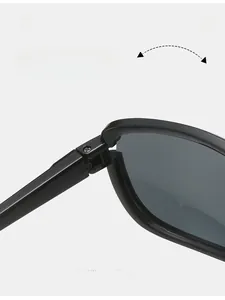 Macro shot of durable metal hinge on black cycling sunglasses with smooth folding details