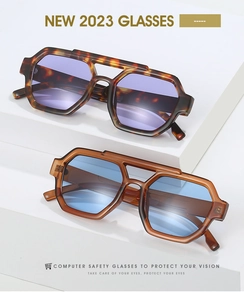 Detail view of double bridge square sunglasses in tortoiseshell and amber frames