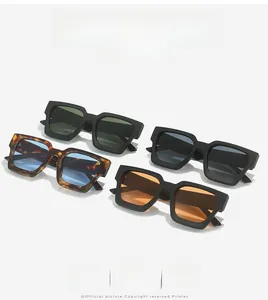 Flat lay of square frame sunglasses with four lens colors including blue and orange lenses