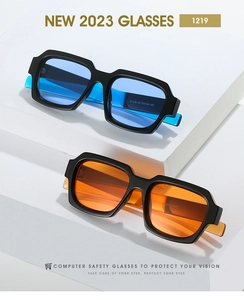 Detail view of square fashion sunglasses showing model number and frame size on temple