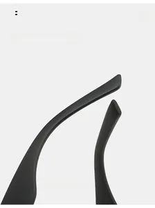 Detail view of black curved mirror legs on retro square sunglasses with matte finish