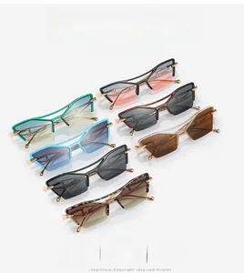 Flat lay of retro cat eye sunglasses in multiple colors with hollow metal frames