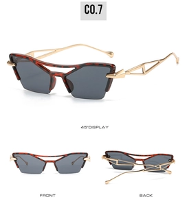 Detail of vintage cat eye sunglasses featuring gold hollow metal temples and tortoiseshell frame