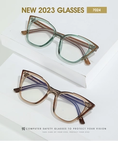 Cat eye blue light blocking glasses in sage green and tea brown translucent frames