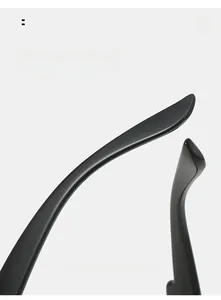 Detail of curved ergonomic temple legs on black sunglasses for comfortable daily wear