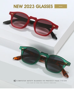 Detail of trendy punk sunglasses with metallic accents and retro geometric frames