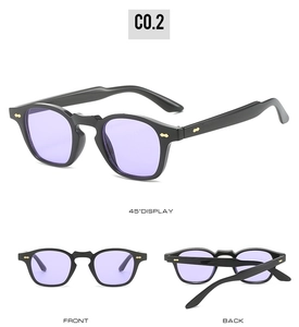 Detailed views of punk polygon sunglasses with black frames and purple lenses