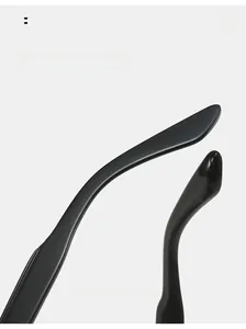 Macro detail of glossy black curved sunglasses legs with ergonomic design for comfort