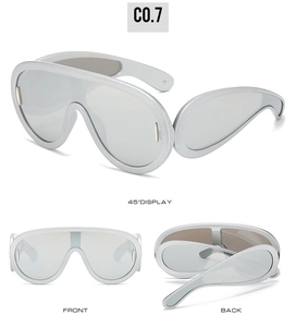Three-way view showing front, side and back of silver futuristic shield sunglasses