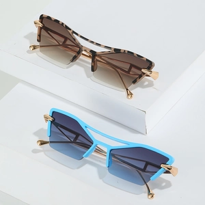 Modern cat-eye sunglasses with geometric frames and gold metal temples in dual color options
