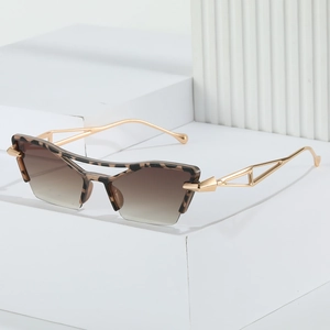 Vintage cat eye sunglasses with leopard frame and gold hollow metal temples