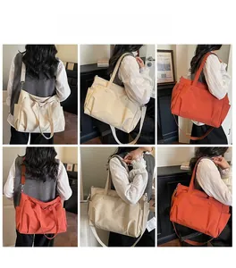 Thickened Oxford fabric tote bag details showing side pockets and adjustable strap