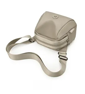 Top view of large capacity khaki oxford fabric crossbody bag with adjustable strap