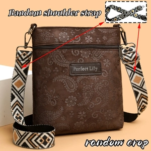 Detail of paisley embossed brown crossbody bag with ethnic style woven wide shoulder strap