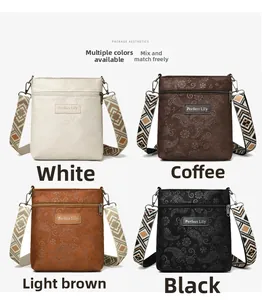 Embossed crossbody bags in four colors with paisley texture and woven shoulder straps