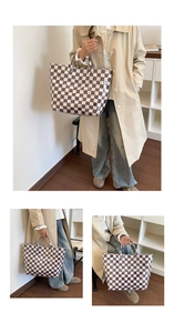 Detailed close-up of brown checkerboard tote bag featuring white TOTE BAG lettering
