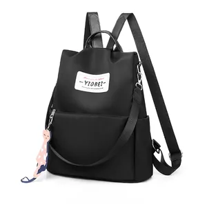 Sac à dos en nylon noir imperméable avec fermeture éclair antivol et porte-clé chat