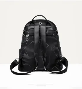Vue arrière du sac à dos en oxford avec motifs géométriques et poche zippée antivol cachée