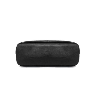 Large black leather tote bag with premium lychee grain texture and minimalist design