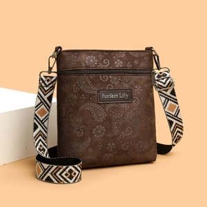 Vintage brown embossed crossbody phone bag with paisley patterns and jacquard strap