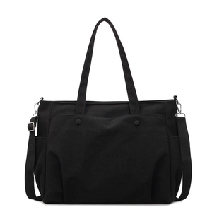 Black Oxford cloth tote bag with adjustable shoulder strap and large capacity