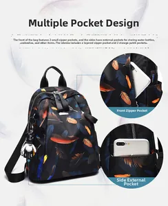 Detail view of feather print backpack featuring multiple functional storage pockets