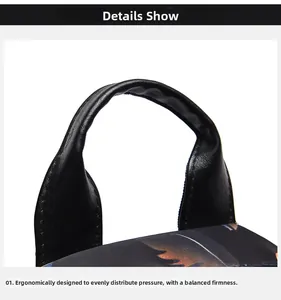 Ergonomic black leather handle detail on floral printed travel backpack with zipper