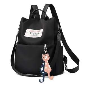 Sac à dos noir en tissu Oxford imperméable avec pendentif chat élégant pour femme