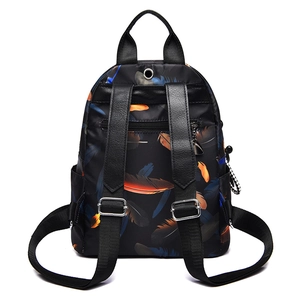 Lightweight black backpack with colorful feather print and anti-theft back pocket