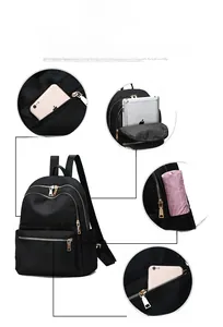 Vues détaillées des poches multiples et de la poche antivol du sac à dos en nylon noir