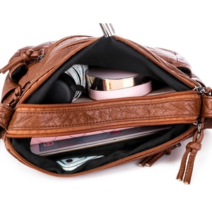 Brown vintage faux leather crossbody bag with multiple zippers and large capacity