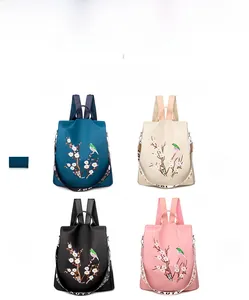 Zaini da donna in quattro colori con ricami di fiori di prugno e martin pescatore