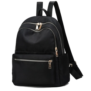 Sac à dos noir en nylon imperméable avec fermetures éclair dorées et grande capacité